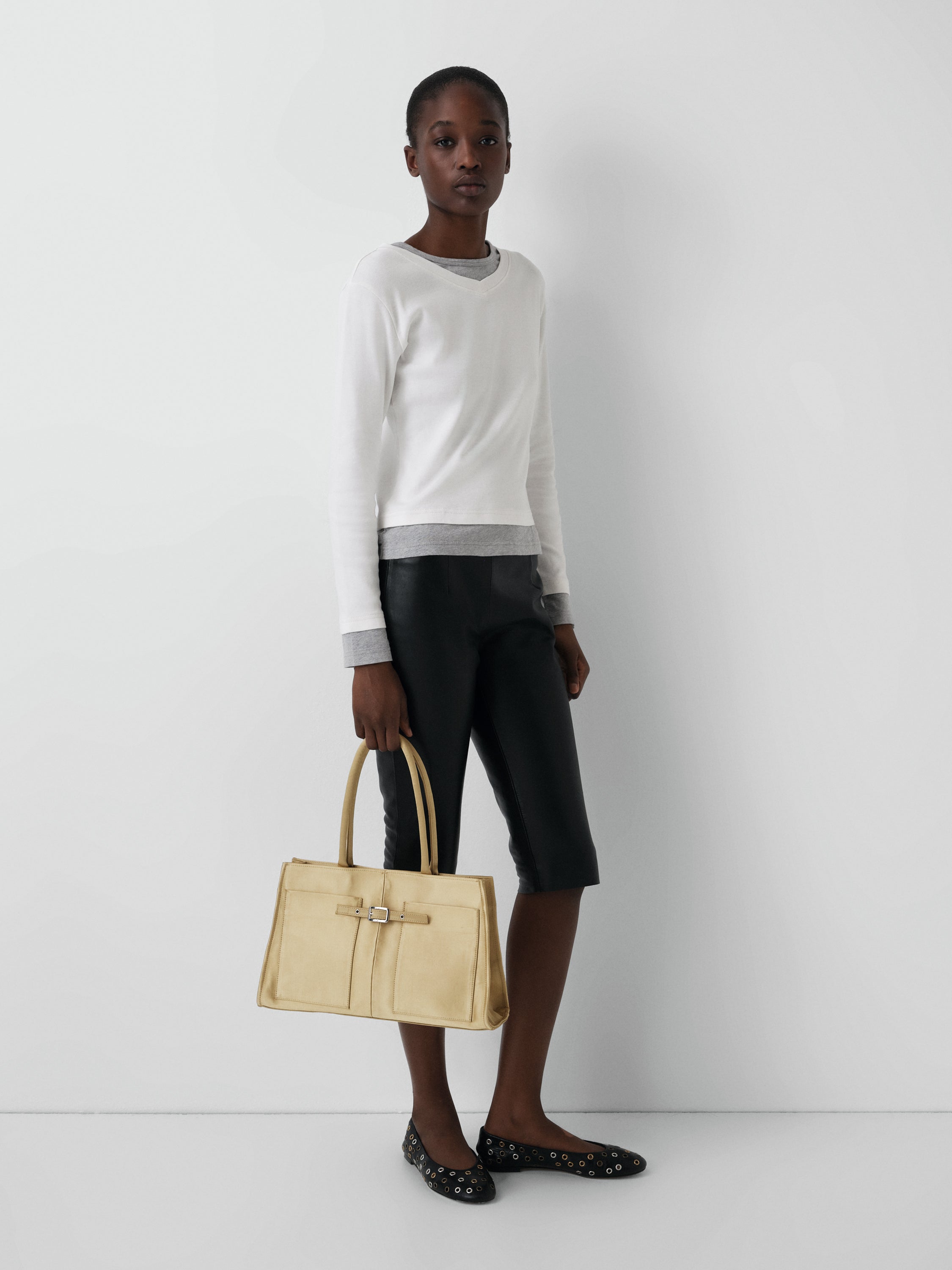 Women's white and grey long-sleeve t-shirt with layered effect