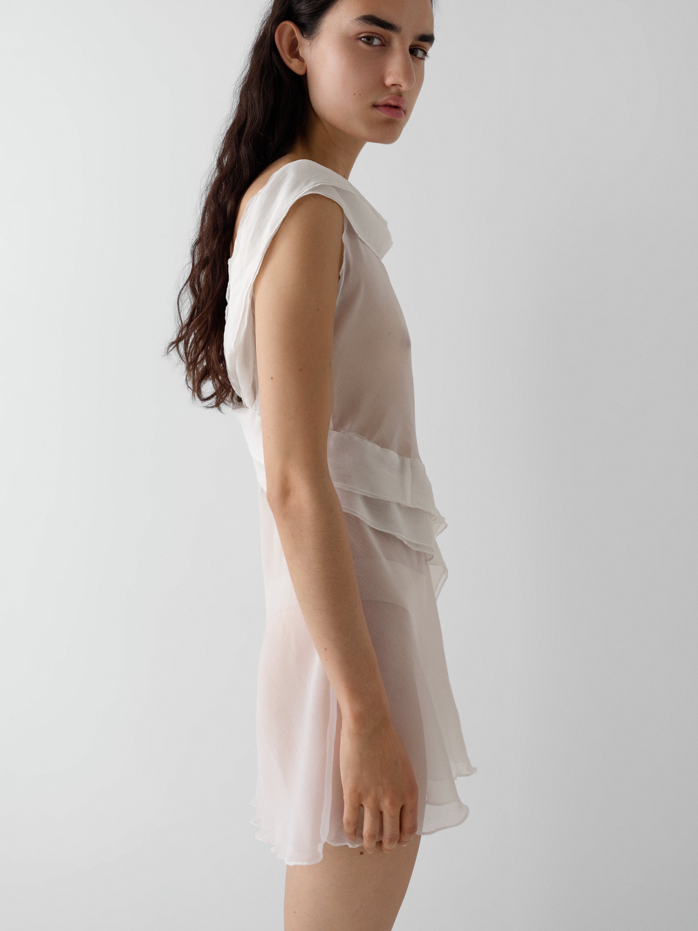 White semi-sheer mini dress with draped ruffle detail – Gimaguas
