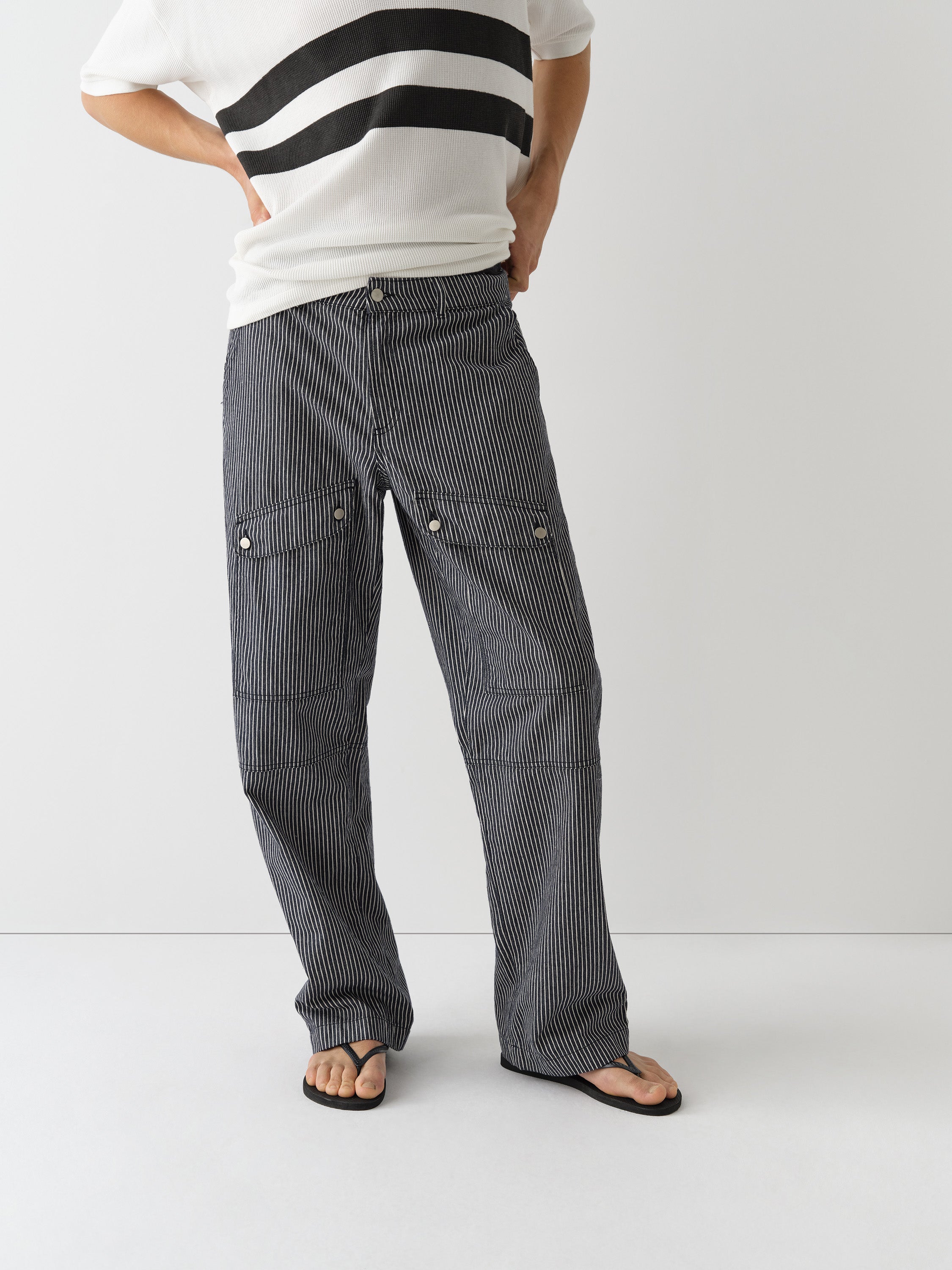 Unisex blue striped trousers with flap pockets and straight fit