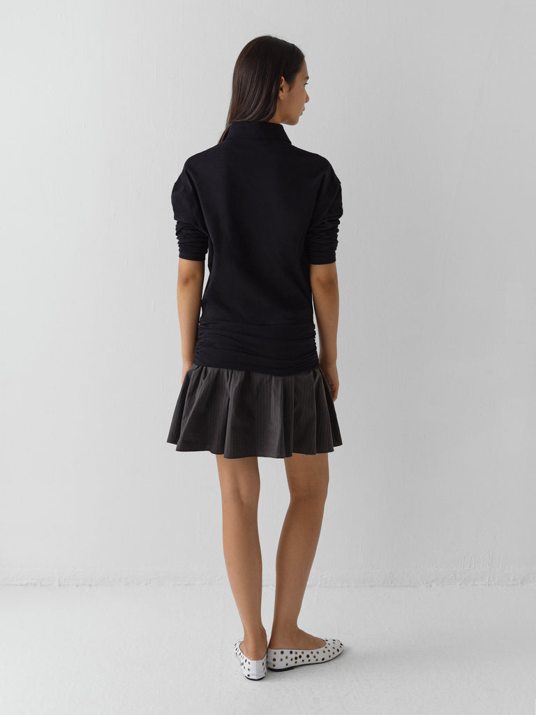 Black long-sleeve polo dress for women with striped skirt Gimaguas Black long-sleeve polo dress for women with striped skirt Gimaguas
