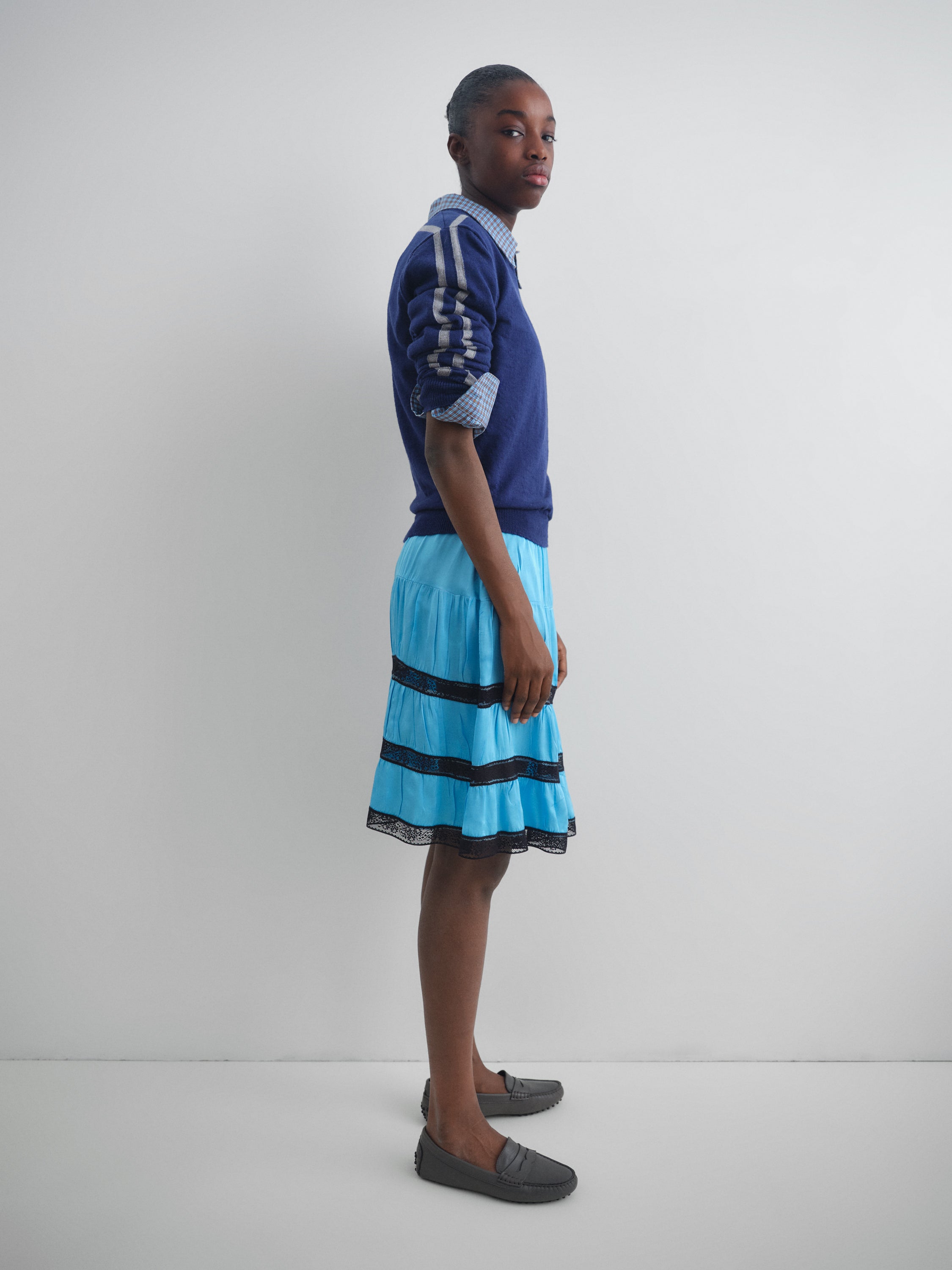 Light blue satin low-rise midi skirt for women with lace trim