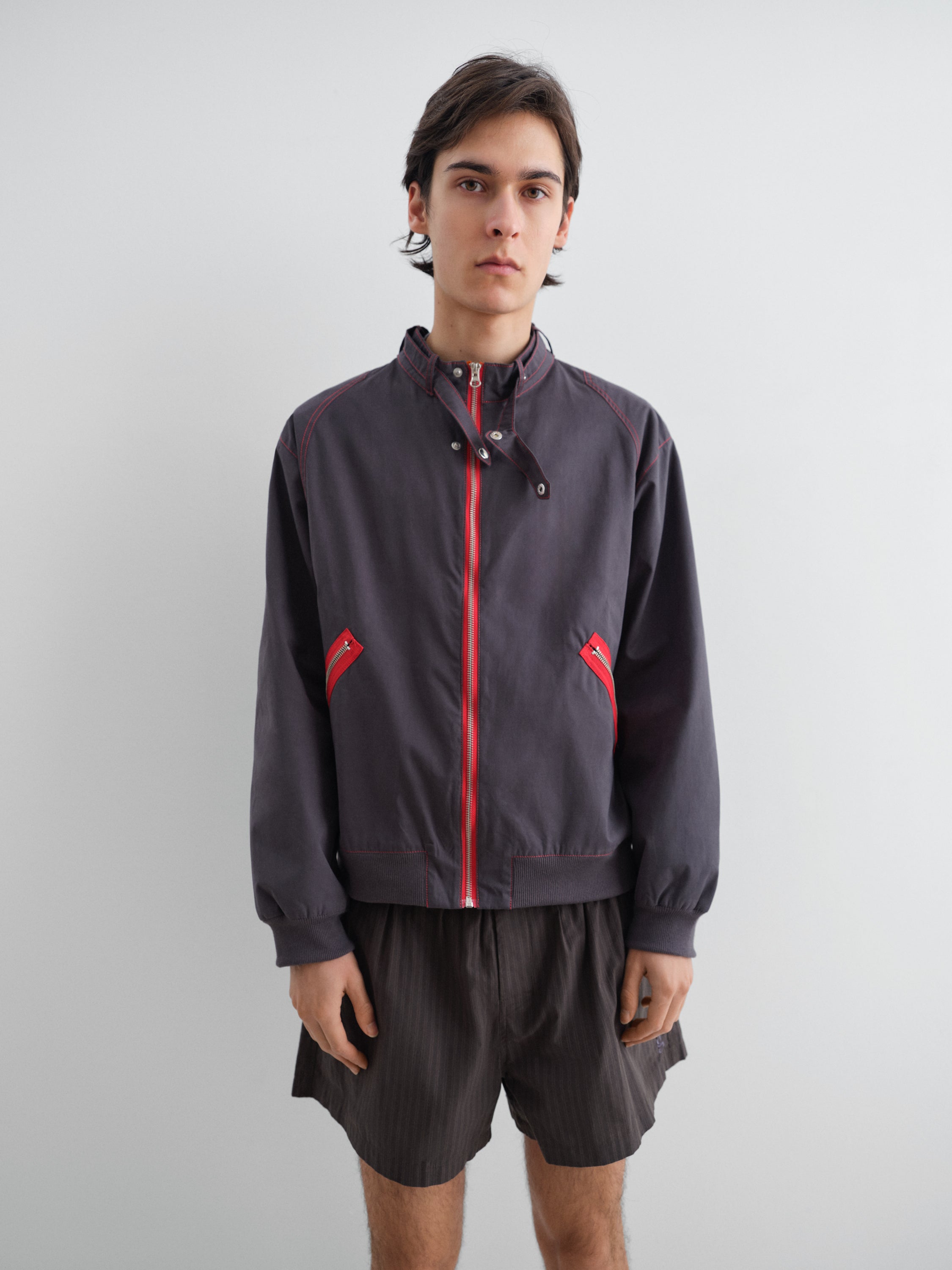 Unisex grey zip-up hoodie with red contrast band – Gimaguas
