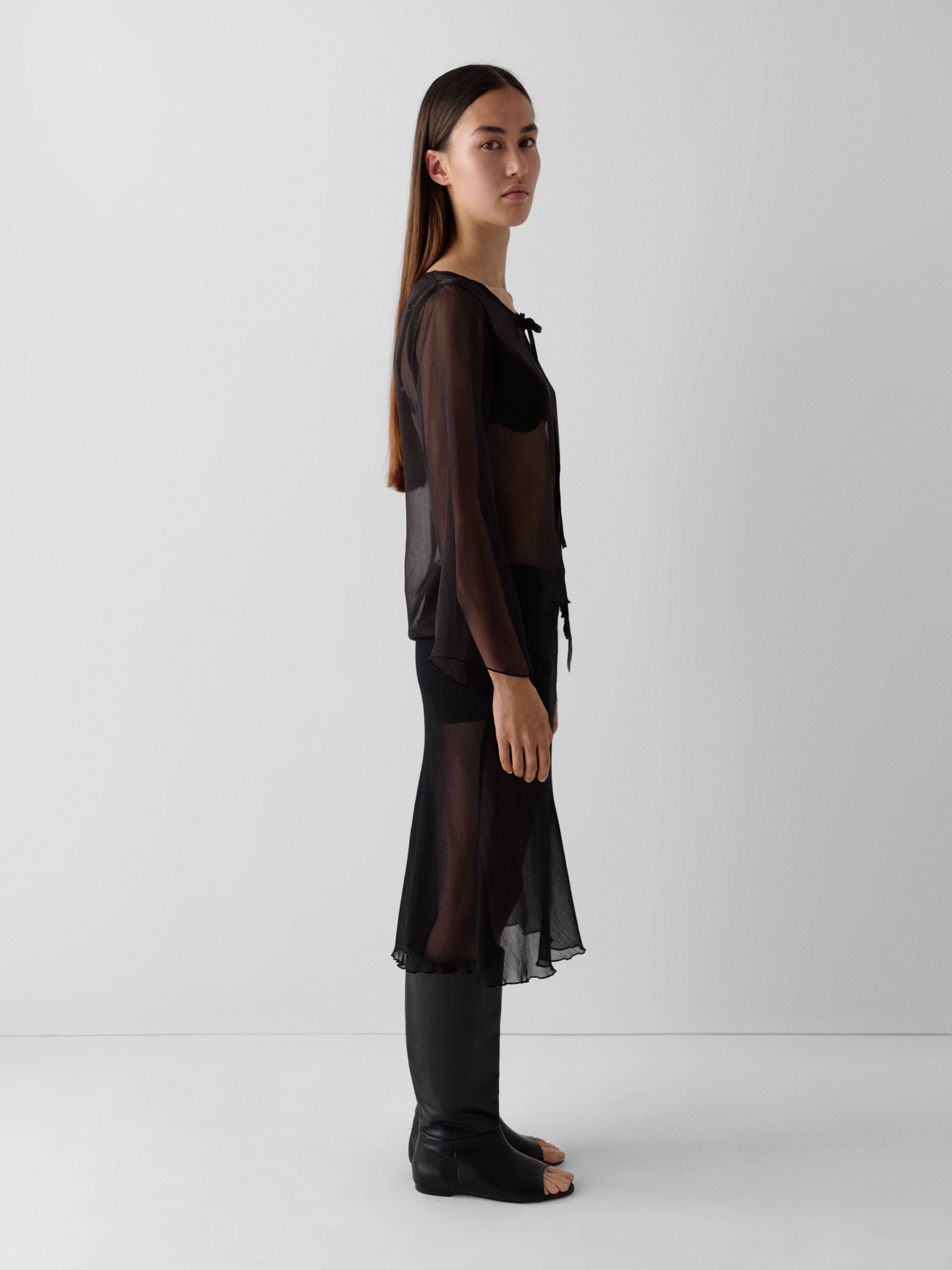 Black semi-sheer midi skirt for women with lace front detail