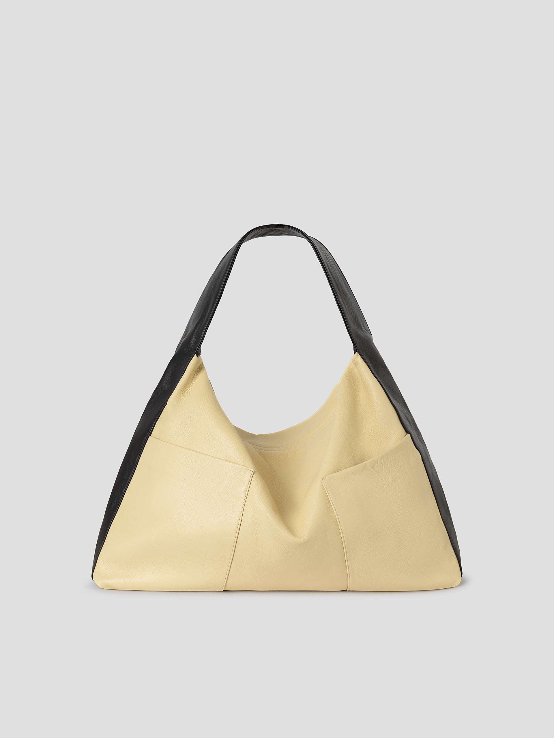 Butter patent leather shoulder bag for women with silver studs
