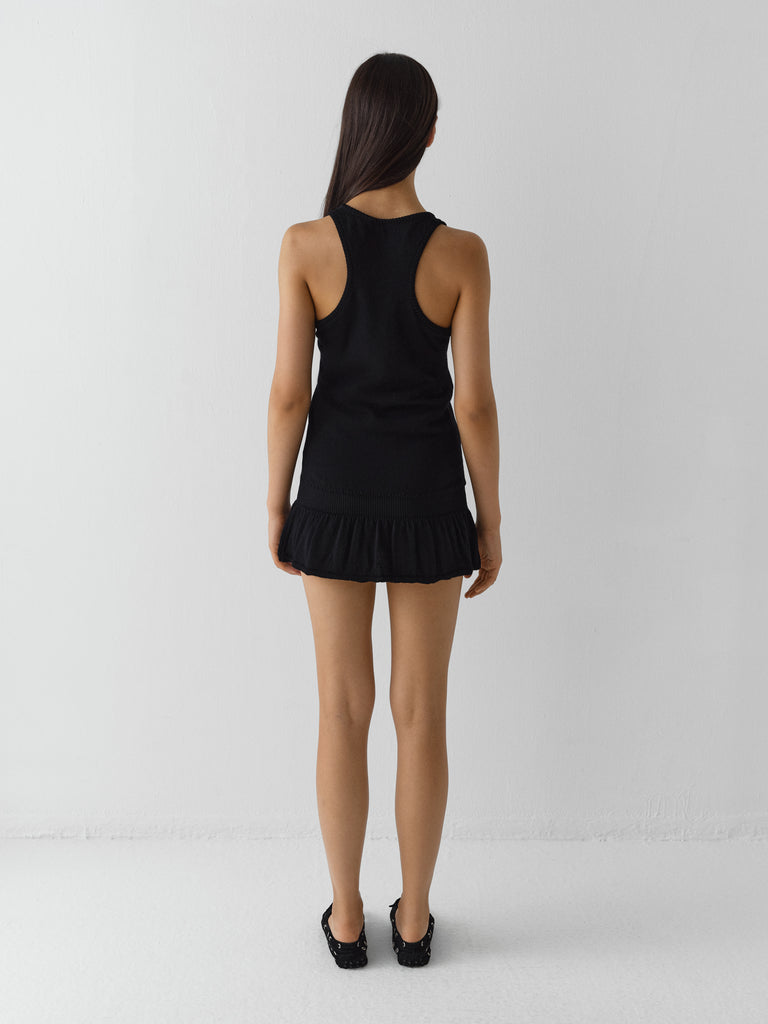 Black sleeveless mini dress with ruffled hem - Gimaguas Black sleeveless mini dress with ruffled hem - Gimaguas