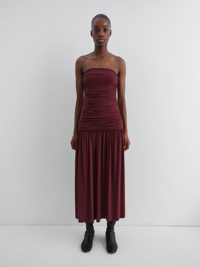 Burgundy strapless maxi dress with asymmetrical hem Gimaguas Burgundy strapless maxi dress with asymmetrical hem Gimaguas
