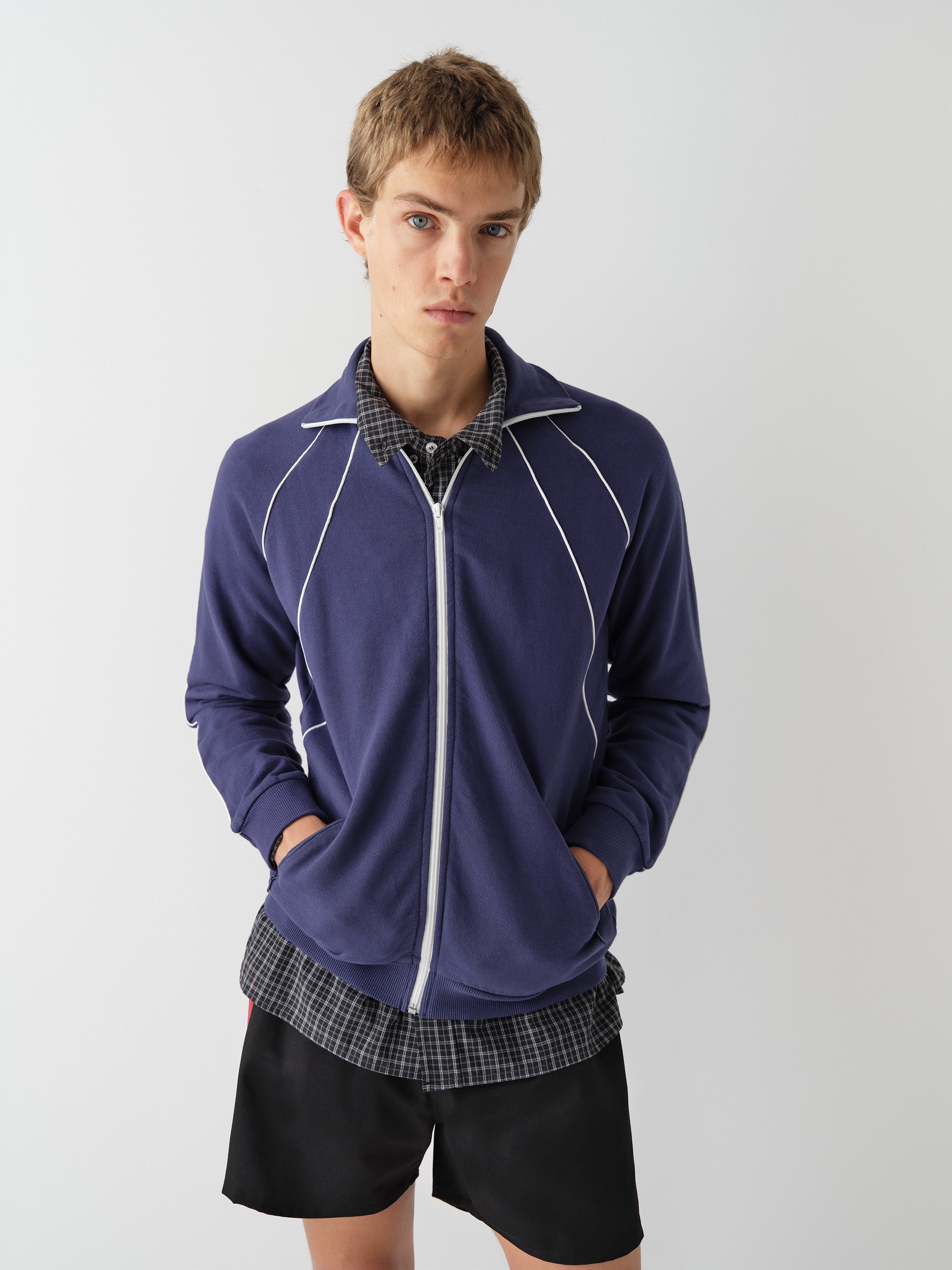 Navy track jacket with white contrast piping – Gimaguas