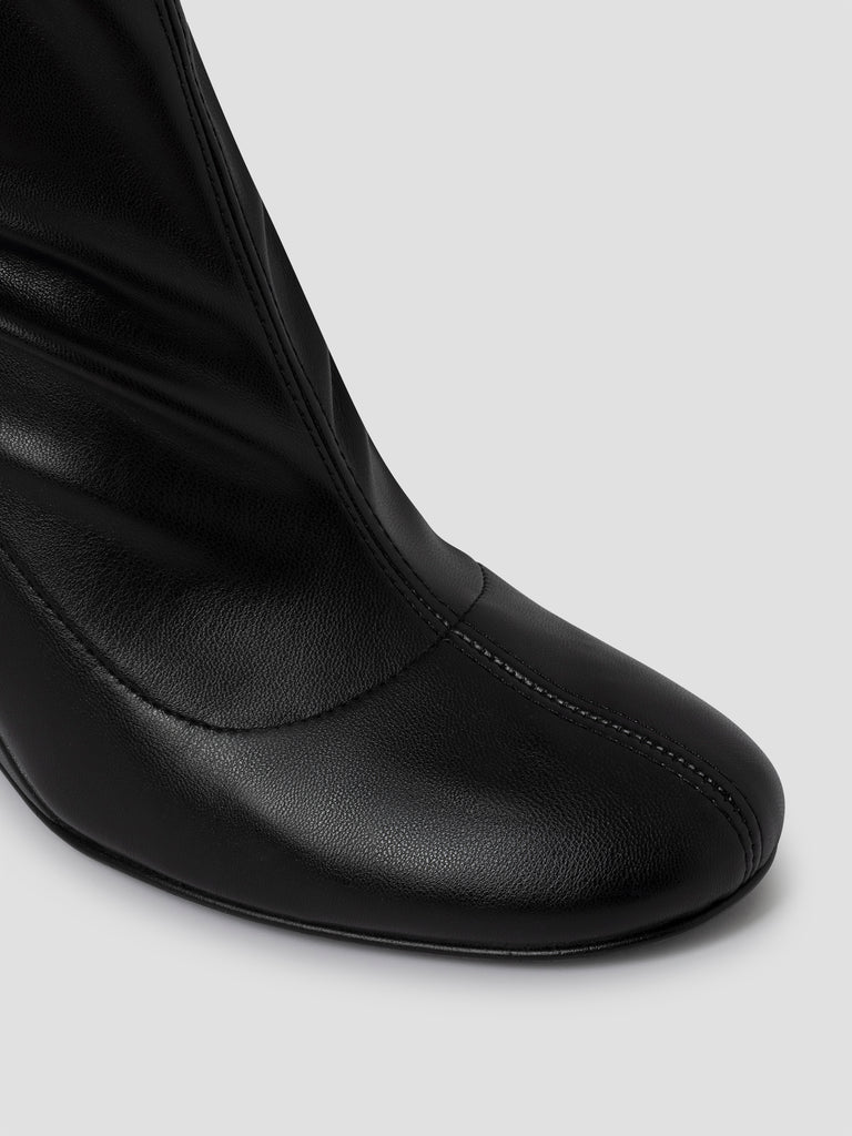 Black leather knee-high wedge boots for women - Gimaguas Black leather knee-high wedge boots for women - Gimaguas