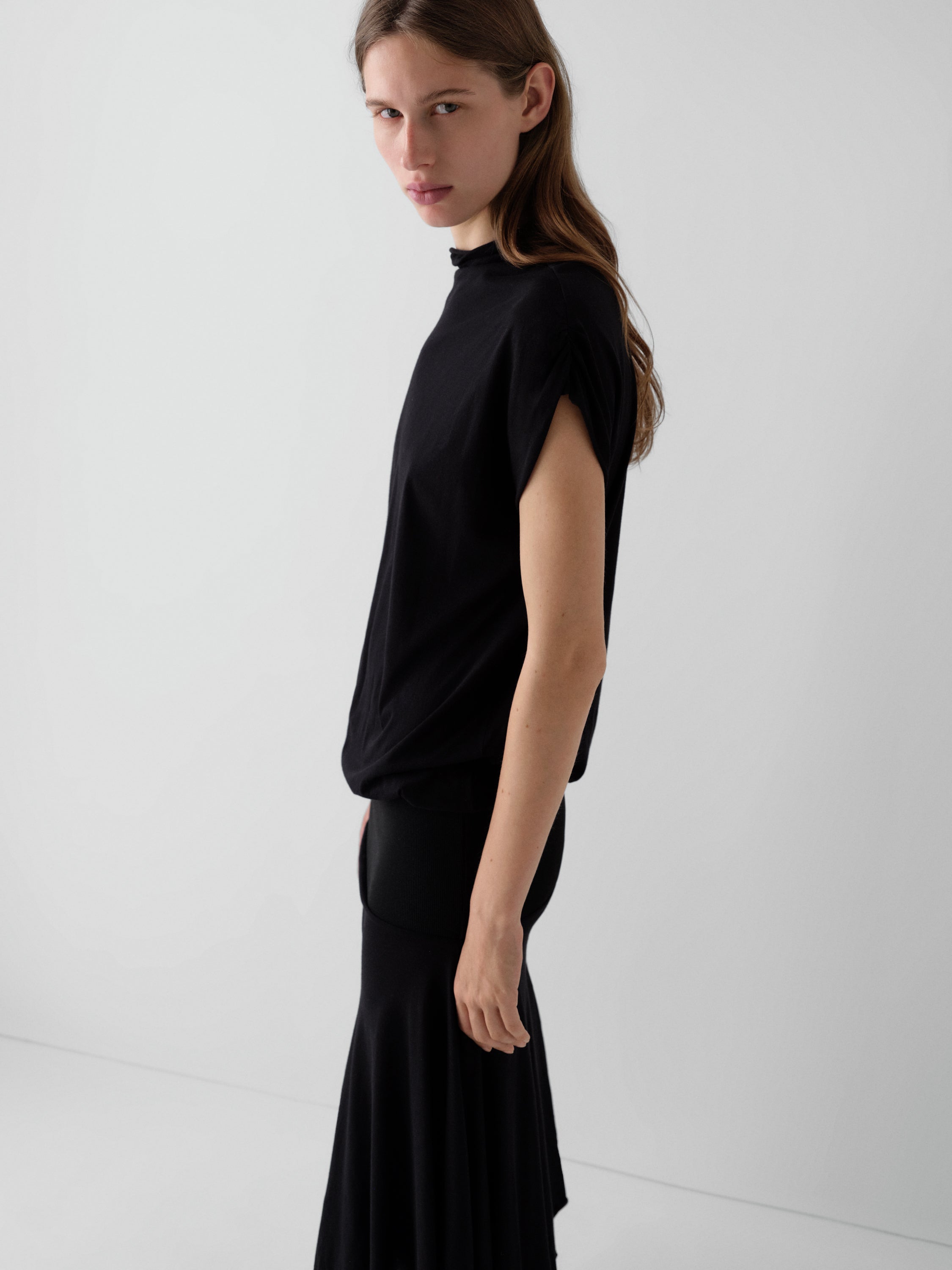 Black two-piece effect dress for women with asymmetric hem – Gimaguas