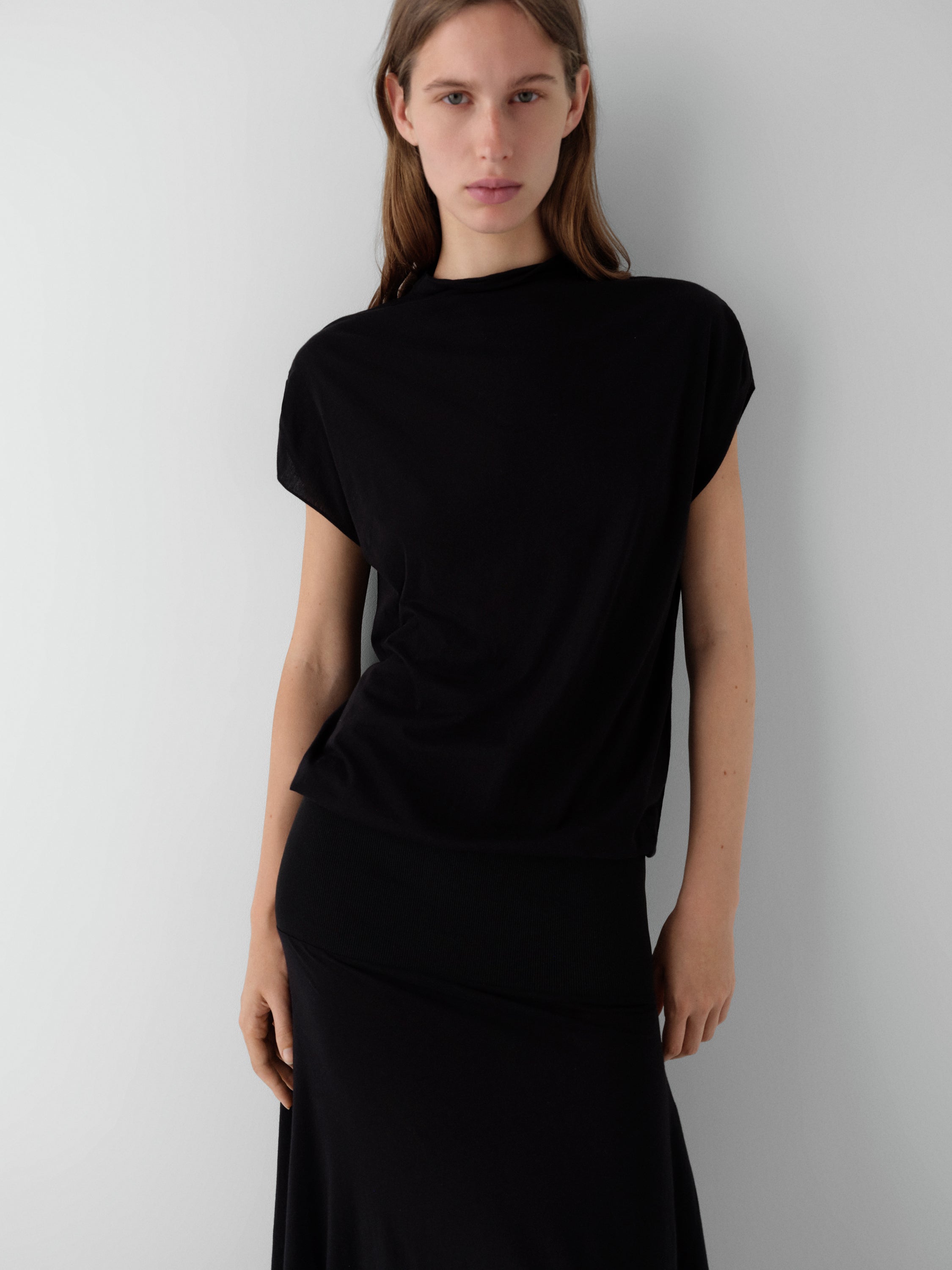 Black two-piece effect dress for women with asymmetric hem – Gimaguas