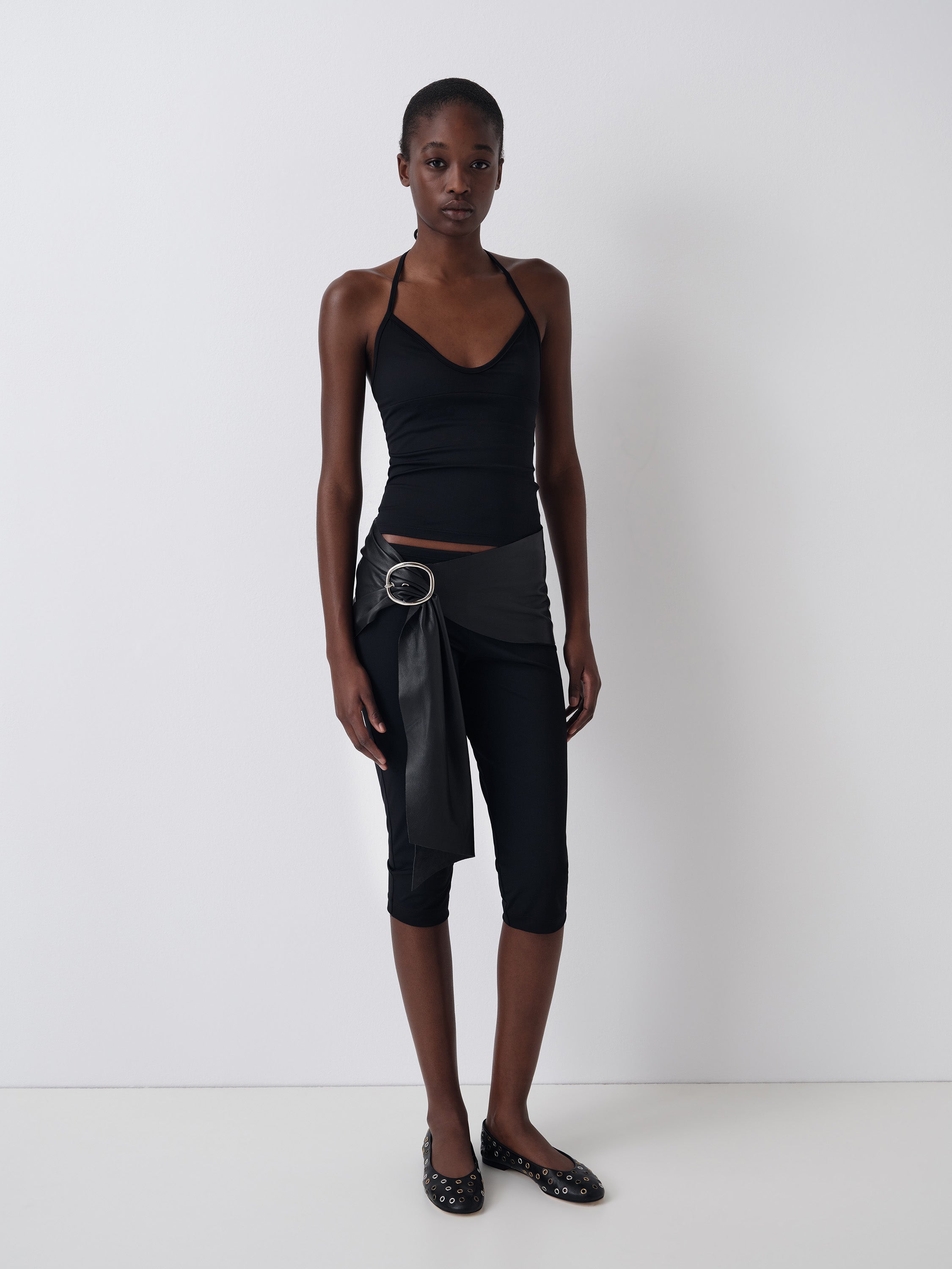 Women's Black Fitted Top Flared Hem. Gimaguas