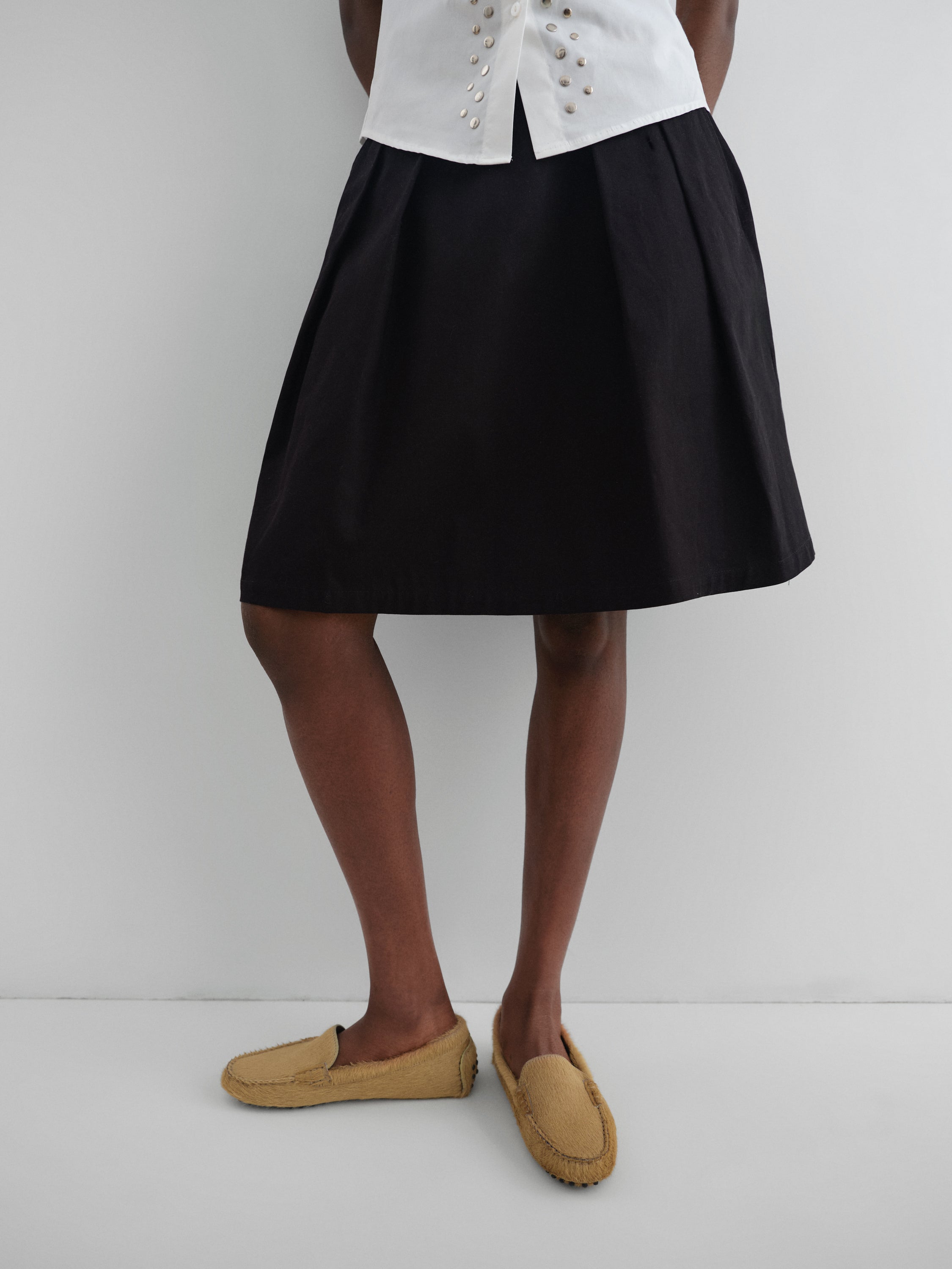 Black A-line midi skirt with silver belt detail - Gimaguas