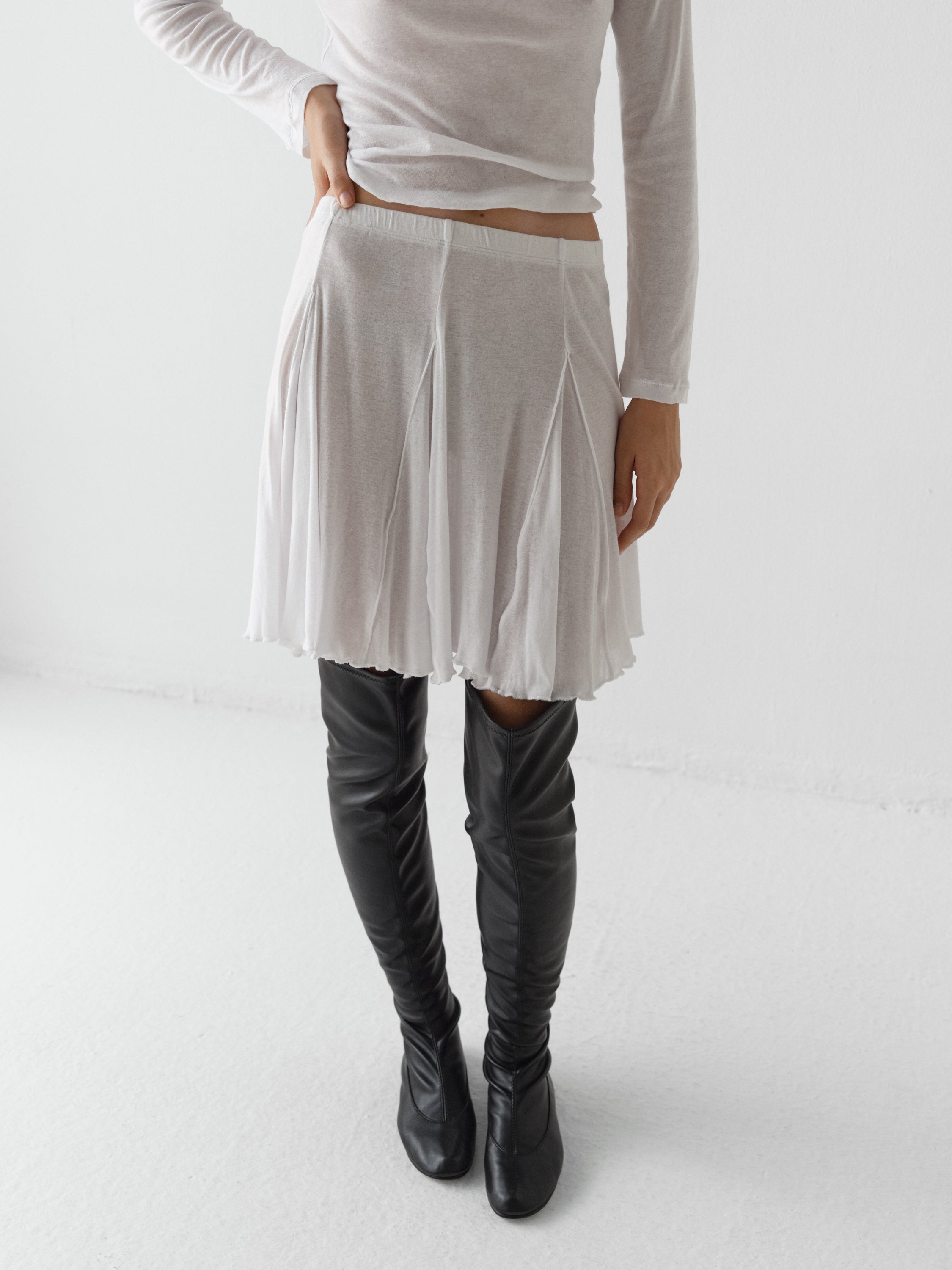 White semi-sheer midi skirt for women with pointed hem