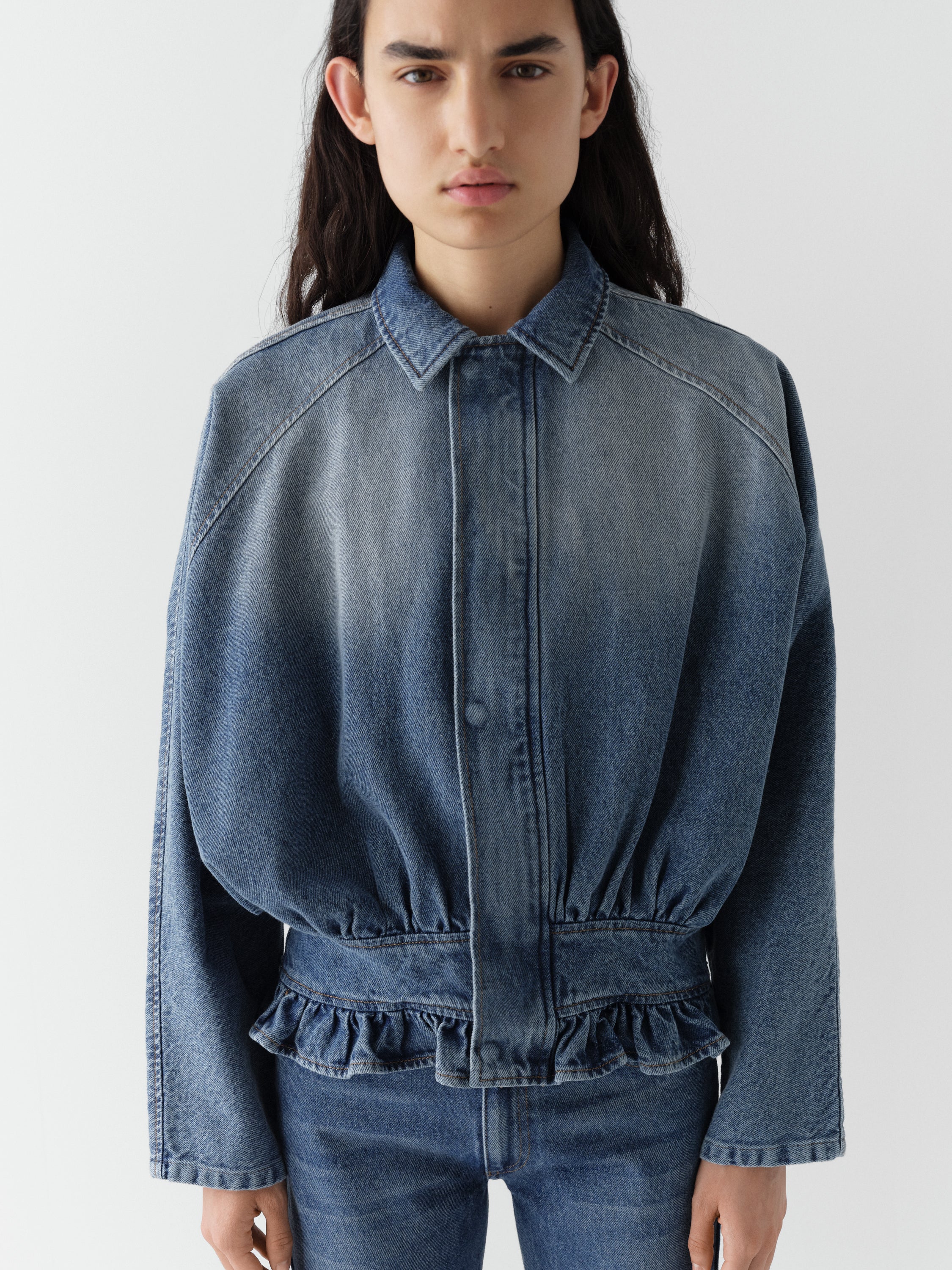 washed-blue-denim-balloon-jacket-for-women-with-ruffled-hem-gimaguas