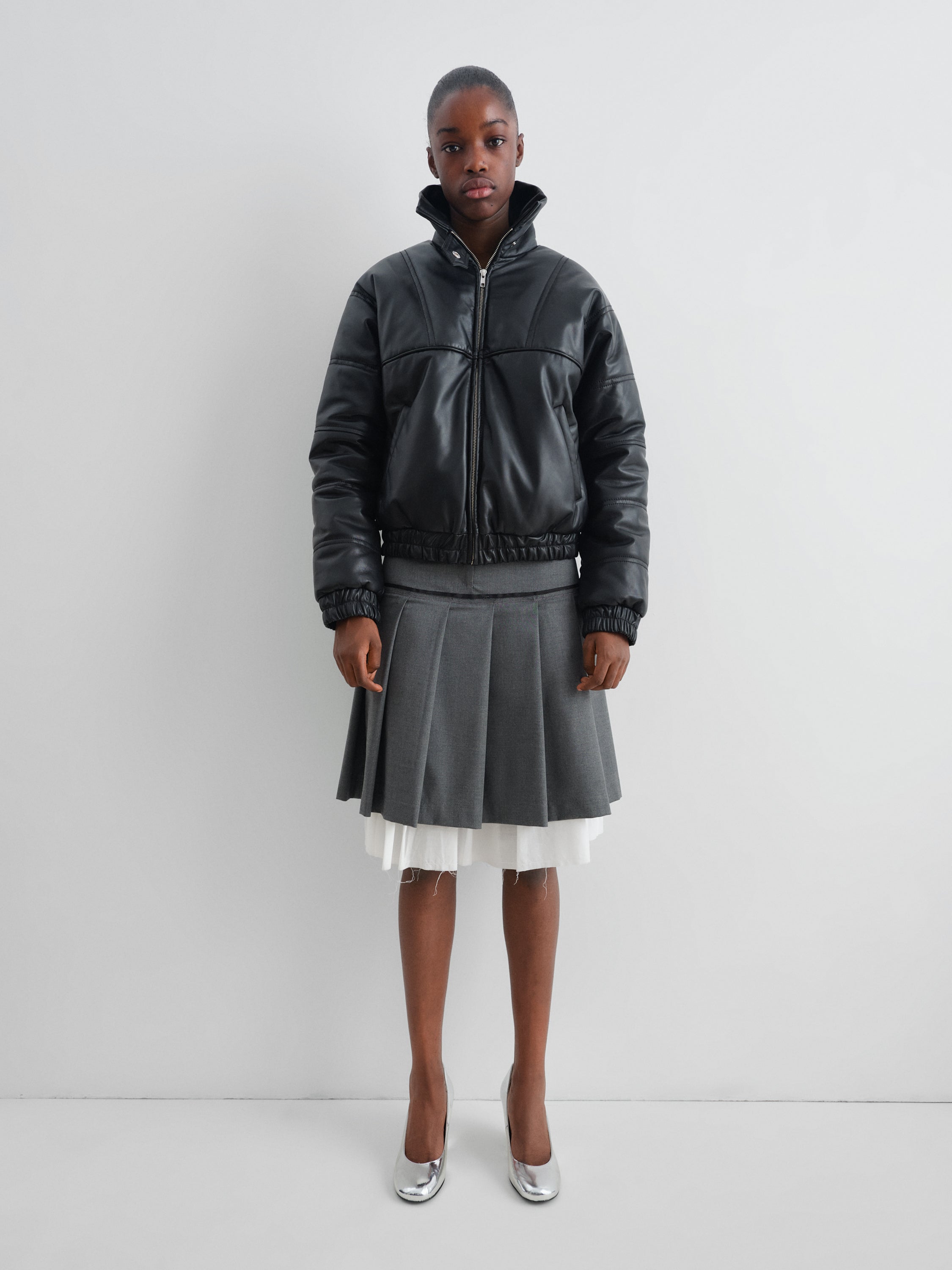 Women's black leather puffer jacket with asymmetric flap – Gimaguas
