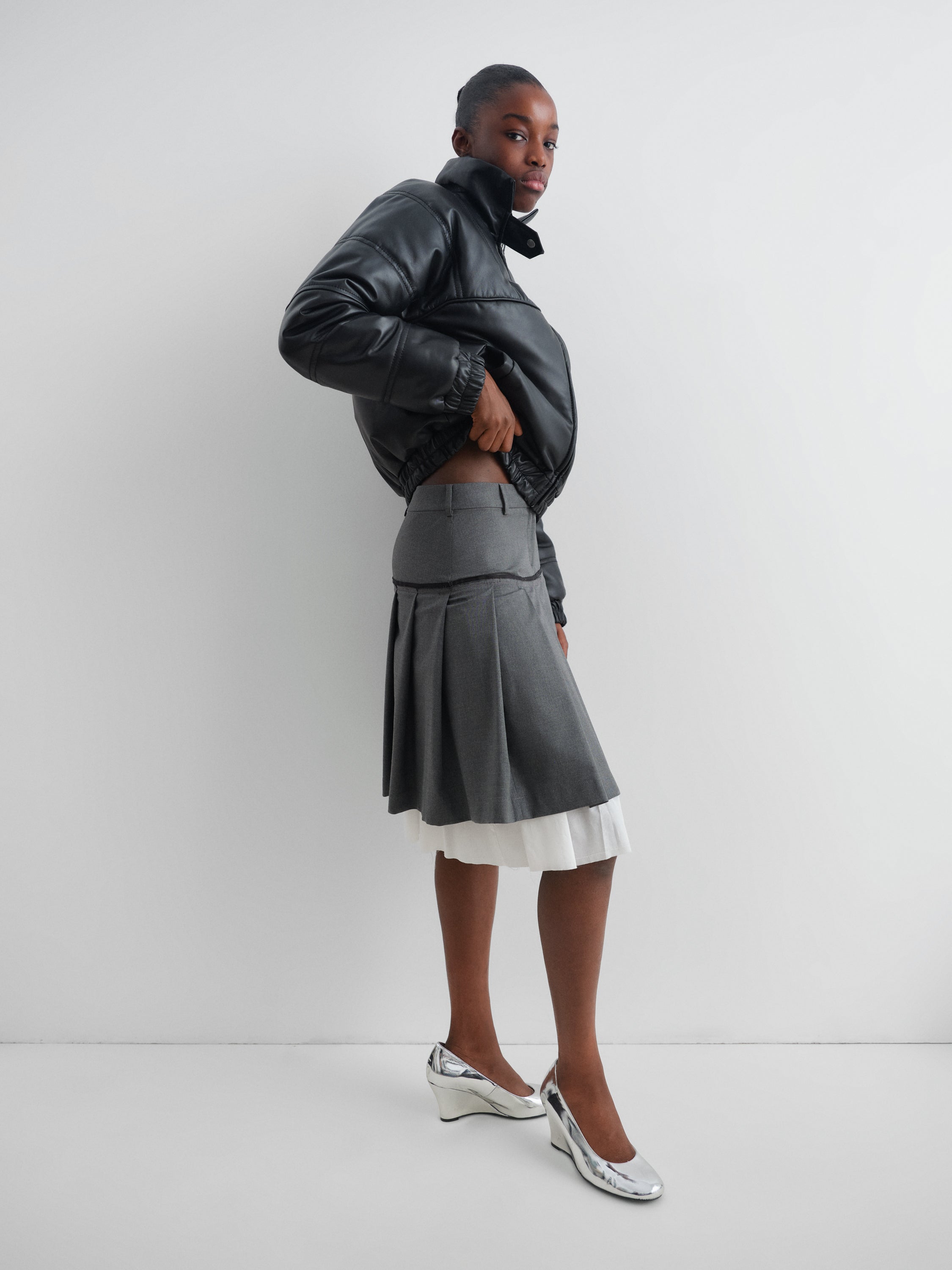 Women's black leather puffer jacket with asymmetric flap – Gimaguas