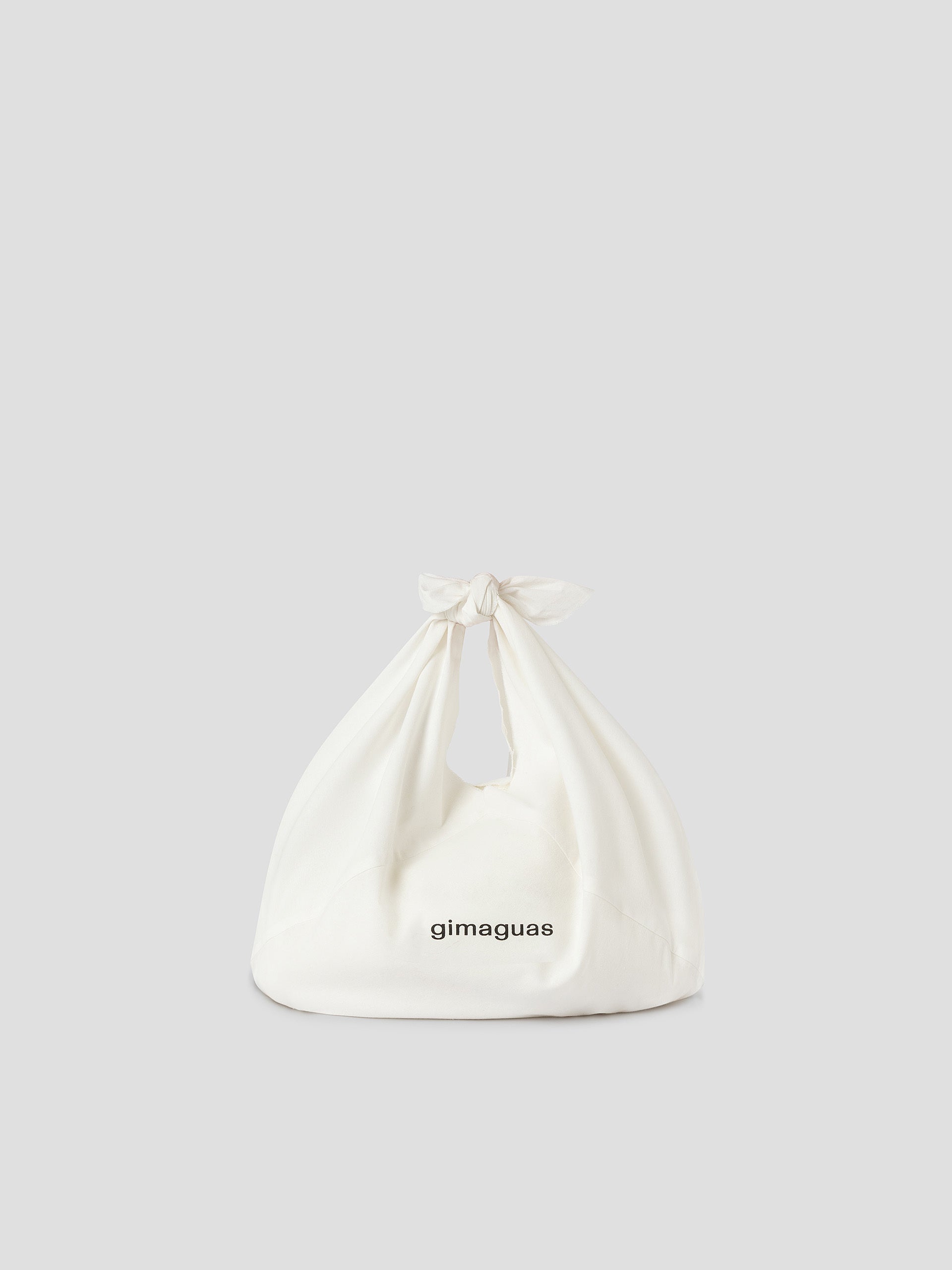 Foldable beige canvas shoulder bag for women with black trim